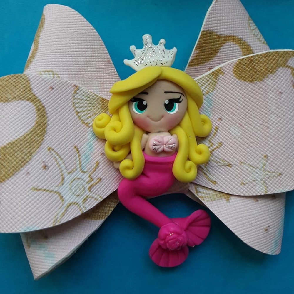 Handmade Faux leather bow with clay Mermaid in ctr